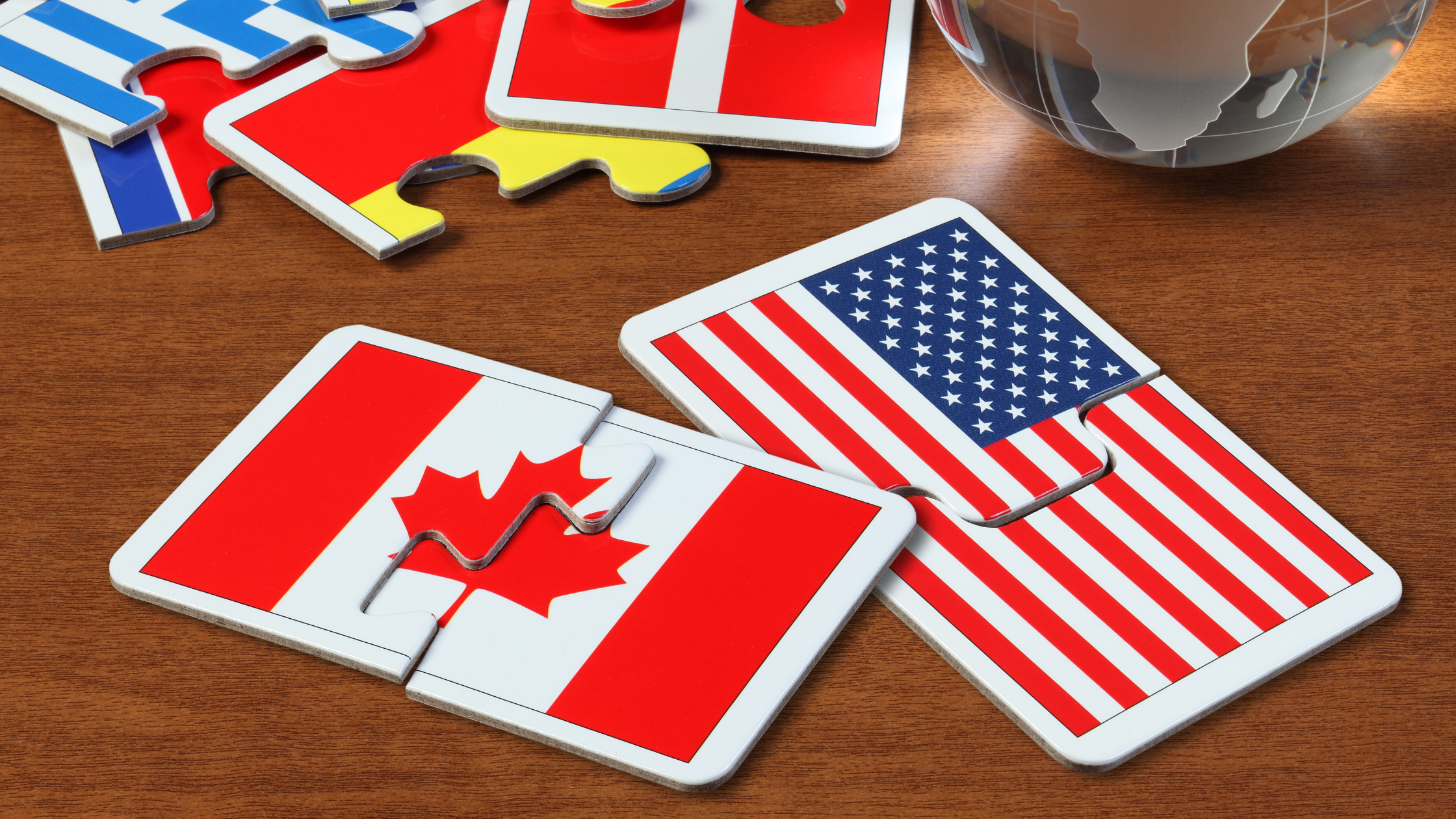 US and Canada flag puzzle pieces
